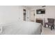 Comfortable bedroom featuring a TV, chair, sliding closet doors, and ample natural light at 502 E Le Marche Ave, Phoenix, AZ 85022