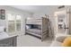 Comfortable bunk bed setup with natural light streaming through plantation shutters at 502 E Le Marche Ave, Phoenix, AZ 85022