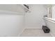 Walk-in closet providing ample storage space with shelving and clothing racks at 502 E Le Marche Ave, Phoenix, AZ 85022