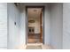 Cozy entryway featuring wood-look floors, decor and a decorative front door at 502 E Le Marche Ave, Phoenix, AZ 85022
