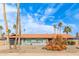 Single Gathering home with desert landscaping, tile roof and mature palm trees at 502 E Le Marche Ave, Phoenix, AZ 85022