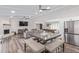 Open-concept layout combines the kitchen, dining, and living areas for seamless entertaining at 502 E Le Marche Ave, Phoenix, AZ 85022