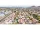 Aerial shot of a neighborhood with palms, swimming pools and homes with solar panels at 502 E Le Marche Ave, Phoenix, AZ 85022