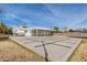 Large backyard with expansive patio and string lights at 521 E Lehi Rd, Mesa, AZ 85203