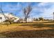 Spacious backyard with a view of the house and surrounding area at 521 E Lehi Rd, Mesa, AZ 85203