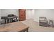 Finished basement with comfortable seating, a media projector, and plenty of space at 521 E Lehi Rd, Mesa, AZ 85203