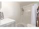 Modern bathroom with a walk-in shower and marble tile at 521 E Lehi Rd, Mesa, AZ 85203