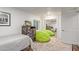 Small bedroom with twin bed and beanbag chairs at 521 E Lehi Rd, Mesa, AZ 85203