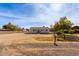 Single story home with a large yard at 521 E Lehi Rd, Mesa, AZ 85203
