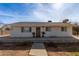 Front view of a remodeled home with new landscaping at 521 E Lehi Rd, Mesa, AZ 85203