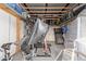 Spacious home gym with various exercise equipment at 521 E Lehi Rd, Mesa, AZ 85203