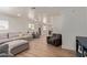 Spacious living room with hardwood floors and comfortable seating at 521 E Lehi Rd, Mesa, AZ 85203