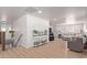 Open concept living area with hardwood floors and stylish furniture at 521 E Lehi Rd, Mesa, AZ 85203