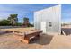 Covered pool table with storage shed in background at 521 E Lehi Rd, Mesa, AZ 85203