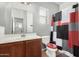 Bathroom featuring an extended vanity with an oversized mirror, a toilet and a standup shower at 5374 W Chisum Trl, Phoenix, AZ 85083