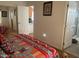 Comfortable bedroom with doorway views into the kitchen and bathroom areas at 8700 E University Dr # 1315, Mesa, AZ 85207