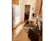 Efficient kitchen with wood cabinets, wood-look floors, and stainless steel appliances at 8700 E University Dr # 1315, Mesa, AZ 85207