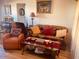 Living room with sofa, recliner, and coffee table at 8700 E University Dr # 1315, Mesa, AZ 85207
