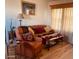 Living room with sofa, recliner, and coffee table at 8700 E University Dr # 1315, Mesa, AZ 85207