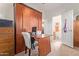 Home office features a wall bed, desk, and plenty of storage at 8700 E University Dr # 1315, Mesa, AZ 85207