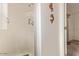 Walk-in shower with tiled walls and a glass door at 8700 E University Dr # 1315, Mesa, AZ 85207