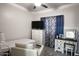 Bedroom with a twin bed and vanity at 968 W Breckenridge Ave, Gilbert, AZ 85233