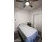 Small bedroom with twin bed and ceiling fan at 968 W Breckenridge Ave, Gilbert, AZ 85233