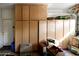 Garage with overhead storage and built-in cabinets at 968 W Breckenridge Ave, Gilbert, AZ 85233