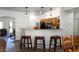 Updated kitchen features stainless steel appliances, light wood cabinets, and granite countertops at 968 W Breckenridge Ave, Gilbert, AZ 85233