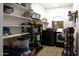 Convenient laundry room with washer, dryer, and ample shelving at 968 W Breckenridge Ave, Gilbert, AZ 85233