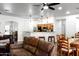 Open-concept living space with kitchen and dining areas at 968 W Breckenridge Ave, Gilbert, AZ 85233