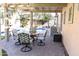 Enjoy dining al fresco on the patio overlooking the pool at 968 W Breckenridge Ave, Gilbert, AZ 85233