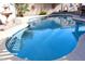 Inviting kidney-shaped pool perfect for relaxation and recreation at 968 W Breckenridge Ave, Gilbert, AZ 85233