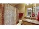 Clean bathroom with shower, toilet and granite countertop at 11454 N 87Th Pl, Scottsdale, AZ 85260