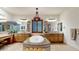 Elegant bathroom with double vanities, a large soaking tub, and plenty of storage at 11454 N 87Th Pl, Scottsdale, AZ 85260