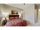 Bedroom with king-size bed, closet, and ensuite bathroom at 11454 N 87Th Pl, Scottsdale, AZ 85260