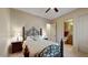 Bright bedroom with a comfortable bed and ensuite bathroom at 11454 N 87Th Pl, Scottsdale, AZ 85260