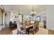 Spacious dining room with a beautiful chandelier and hardwood floors at 11454 N 87Th Pl, Scottsdale, AZ 85260