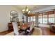 Elegant dining room featuring a large table and stunning chandelier at 11454 N 87Th Pl, Scottsdale, AZ 85260