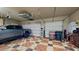 Two-car garage with epoxy flooring and storage at 11454 N 87Th Pl, Scottsdale, AZ 85260