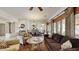 Open living and dining area with hardwood floors and large windows at 11454 N 87Th Pl, Scottsdale, AZ 85260