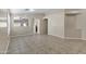 Open concept living area with tile floors and neutral colors at 11838 N 154Th Ave, Surprise, AZ 85379