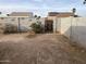 Small backyard with block wall and a gate at 1508 E Todd E Dr, Tempe, AZ 85283
