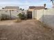 Small backyard with block wall and a gate at 1508 E Todd E Dr, Tempe, AZ 85283