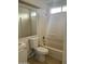 Clean bathroom with a bathtub, toilet, and vanity at 1508 E Todd E Dr, Tempe, AZ 85283