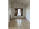 Simple dining room with tile floors and a chandelier at 1508 E Todd E Dr, Tempe, AZ 85283