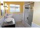Updated bathroom with double sinks and a walk-in shower at 1526 W Wilshire Dr, Phoenix, AZ 85007