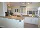 Modern kitchen with granite countertops and stainless steel appliances at 1526 W Wilshire Dr, Phoenix, AZ 85007