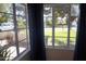 Home with a view of the tree-lined street at 1526 W Wilshire Dr, Phoenix, AZ 85007