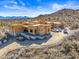 Aerial view of a house under construction with mountain views and a large yard at 15728 N Mountain Pkwy, Fountain Hills, AZ 85268